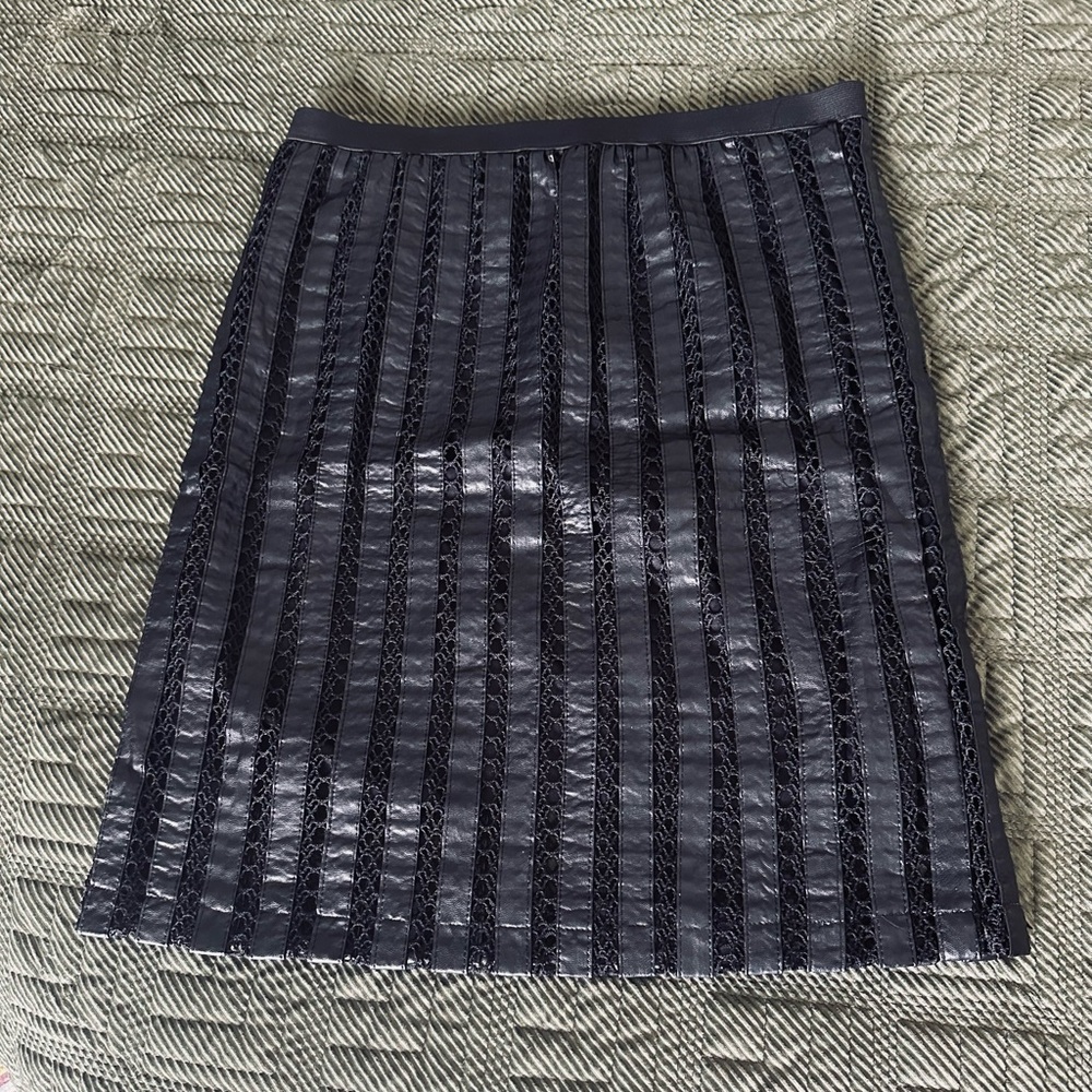 Stretchy faux-leather and lace black skirt. So unique!